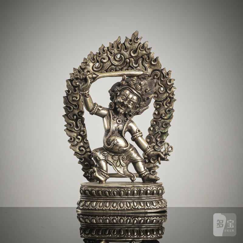 A SILVER FIGURE OF ACALA